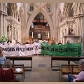 Clergy amongst Wells Cathedral protestors demanding Church of England divests from fossil fuels